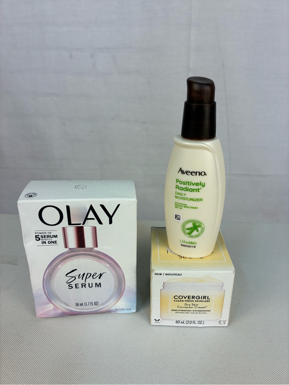 NIP 3Pc Moisturizers Olay Aveeno Covergirl